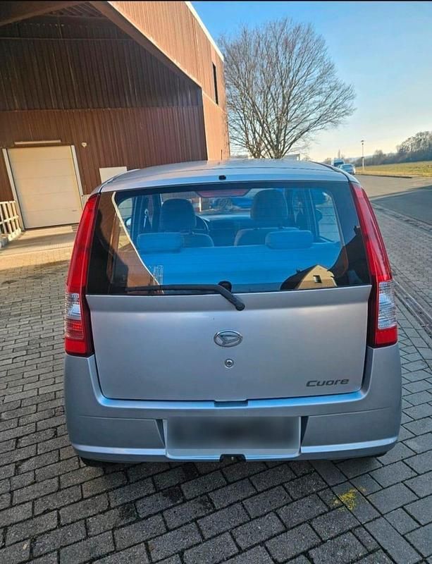 Gebraucht Daihatsu Cuore 58 PS (42 kW) 2003 Silber Kleinwagen