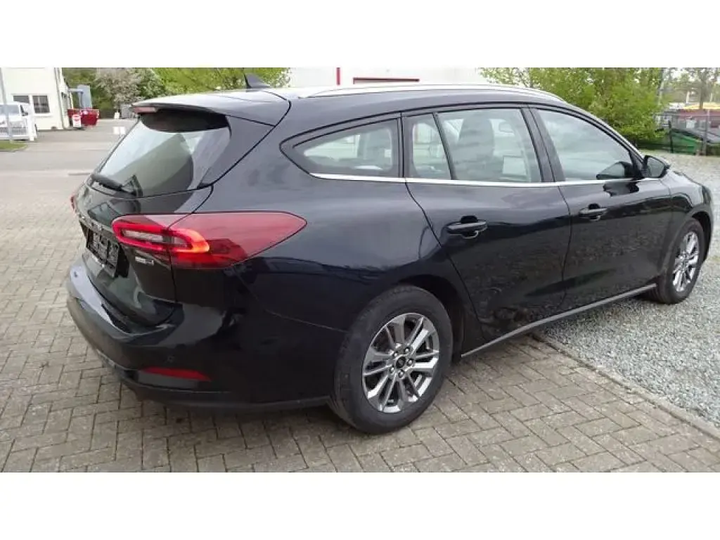Gebraucht Ford Focus Titanium 125 PS (91 kW) 2023 Agate black metallic (metallic) Kombi