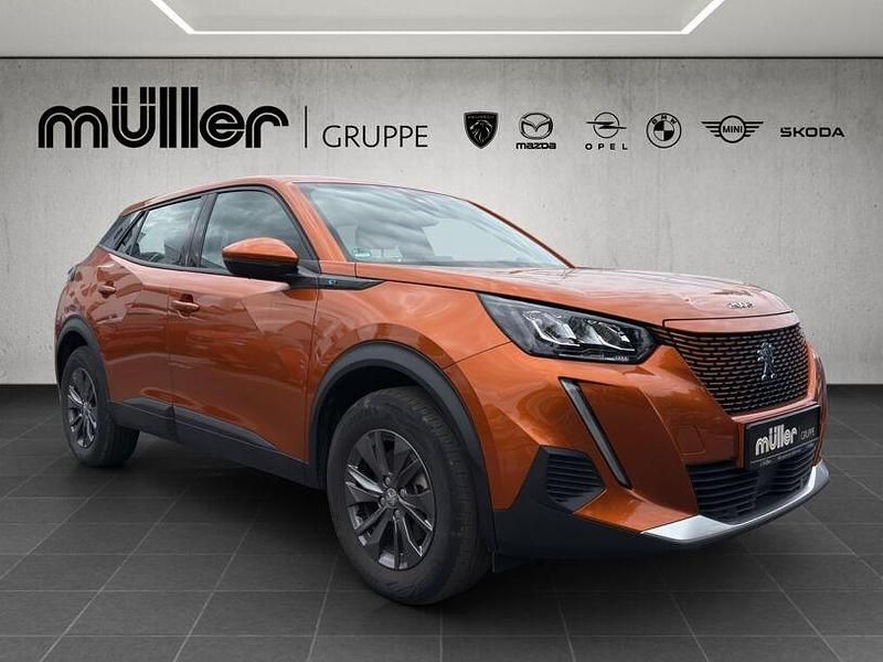 Gebraucht Peugeot e-2008 Active 100 kW (136 PS) 2021 Orange (metallic) SUV