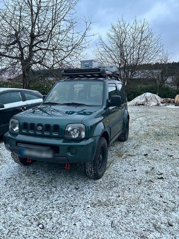 Grün Gebraucht 2002 Suzuki Jimny SUV | 9.000 € - Bild 1/4