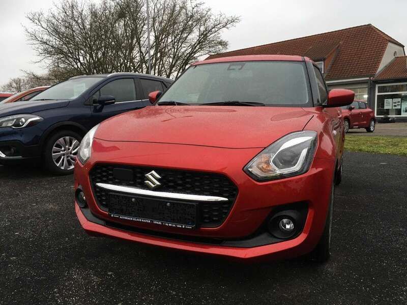 Gebraucht Suzuki Swift Comfort 83 PS (61 kW) 2024 Burning red pearl metallic Kleinwagen