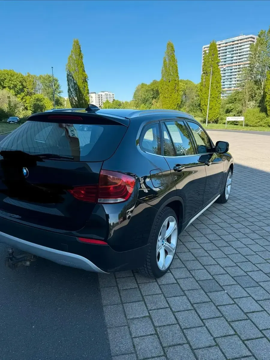 Second-hand BMW X1 184 CP (135 kW) 2012 Negru SUV