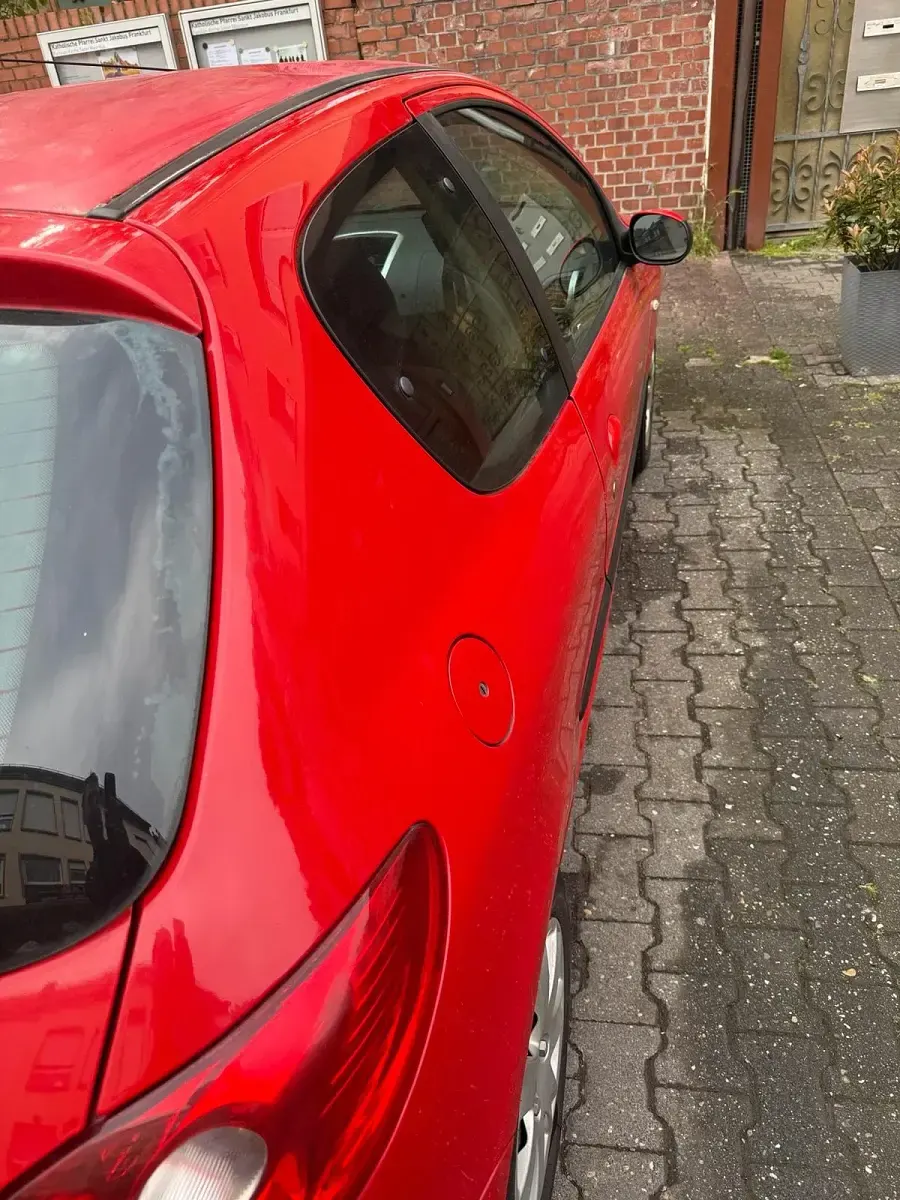 Gebraucht Peugeot 206+ 75 PS (55 kW) 2009 Rot Kleinwagen