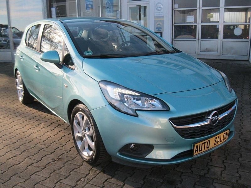 Grün Gebraucht 2015 Opel Corsa Edition Kleinwagen | 8.490 € (Fairer Preis) - Bild 1/4