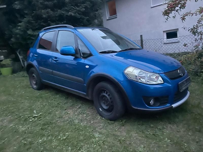 Blau Gebraucht 2009 Suzuki SX4 Kleinwagen | 1.500 € (Guter Preis) - Bild 1/4