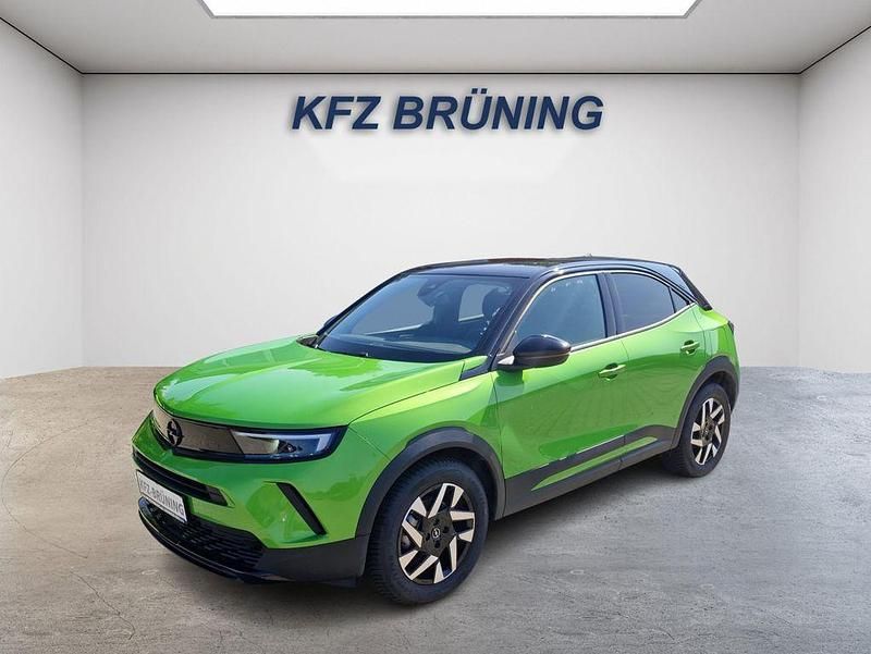 Matcha grün metallic / dac (metallic) Gebraucht 2023 Opel Mokka-e SUV | 17.980 € (Superpreis) - Bild 1/4