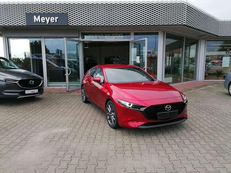 Soul red crystal m Gebraucht 2023 Mazda 3 Exclusive-Line Limousine | 28.590 € (Teuer) - Bild 1/4