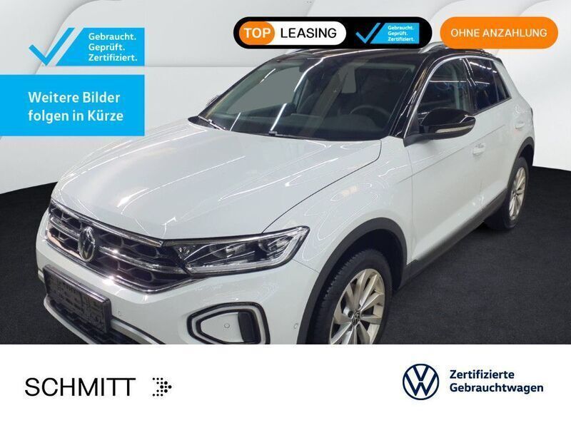 Pure white/schwarz Gebraucht 2024 VW T-Roc Style SUV | 28.499 € (Fairer Preis) - Bild 1/3