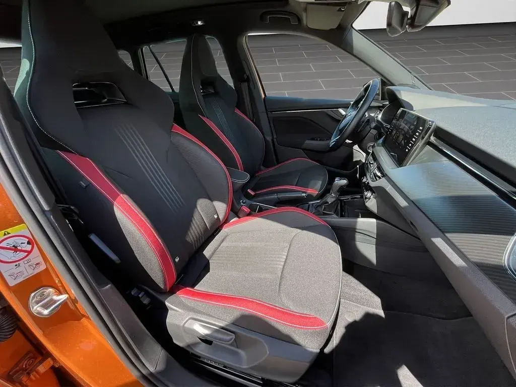 Gebraucht Skoda Kamiq Monte Carlo 150 PS (110 kW) 2023 Phoenixorange premium metallic (metallic) SUV