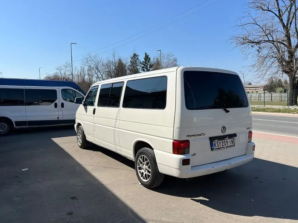 Second-hand VW Caravelle 102 CP (75 kW) 2002 Alb Van