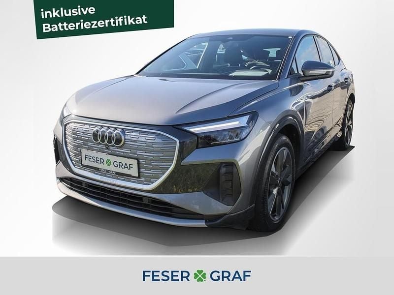 Taifungrau metallic Gebraucht 2022 Audi Q4 Sportback e-tron Ambiente SUV | 29.840 € (Superpreis) - Bild 1/4
