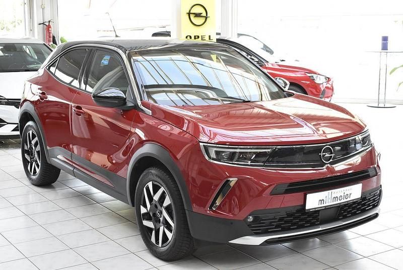 Gebraucht Opel Mokka-e Elegance 100 kW (136 PS) 2024 Kosmos rot met. SUV