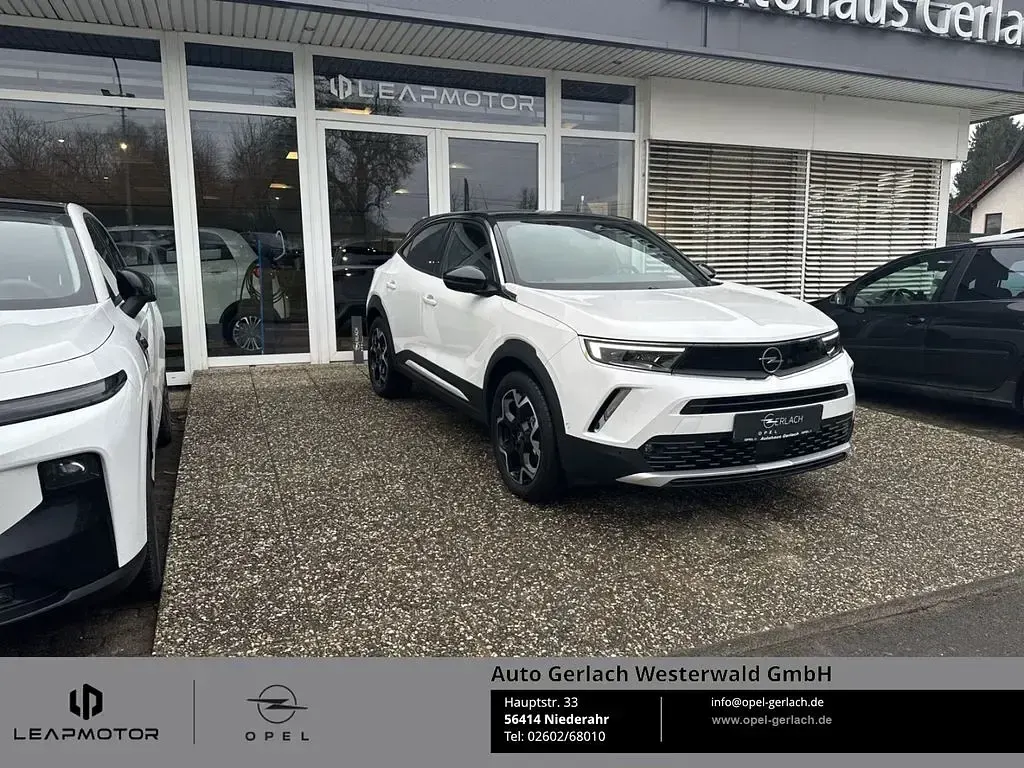 Gebraucht Opel Mokka-e Ultimate 100 kW (136 PS) 2024 Jade weiss/arktis weiss SUV