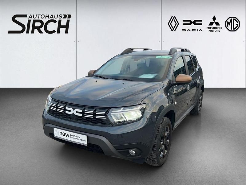 Kometengrau metallic Gebraucht 2024 Dacia Duster Extreme SUV | 24.490 € (Fairer Preis) - Bild 1/4