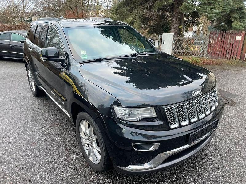 Schwarz Gebraucht 2014 Jeep Grand Cherokee Summit SUV | 13.000 € - Bild 1/4