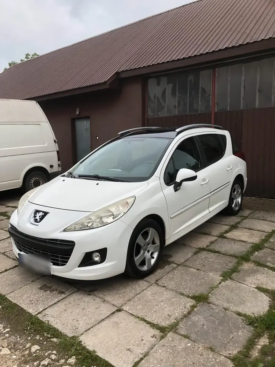 Gebraucht Peugeot 207 90 PS (66 kW) 2011 Weiß Kombi