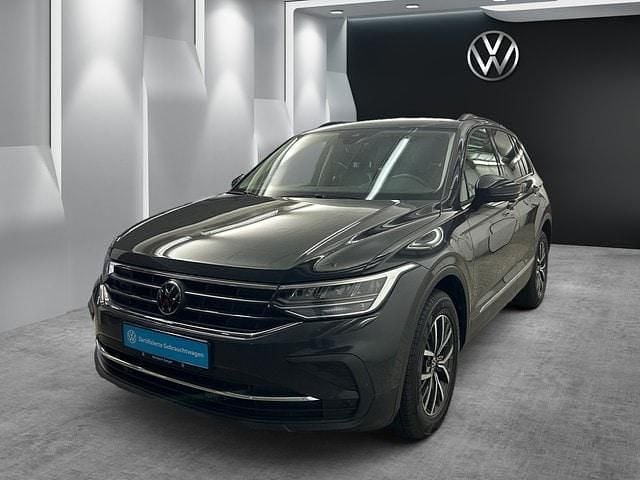 Uranograu Gebraucht 2024 VW Tiguan Business SUV | 32.480 € (Guter Preis) - Bild 1/3