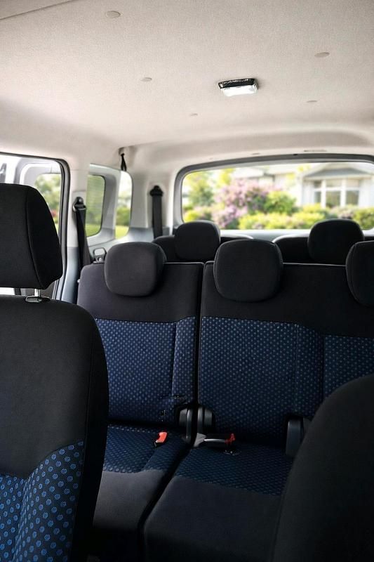 Gebraucht Nissan NV200 110 PS (80 kW) 2011 Silber Van / Kleinbus