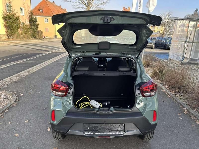 Gebraucht Dacia Spring 19 kW (26 PS) 2023 Olivgrün Kleinwagen