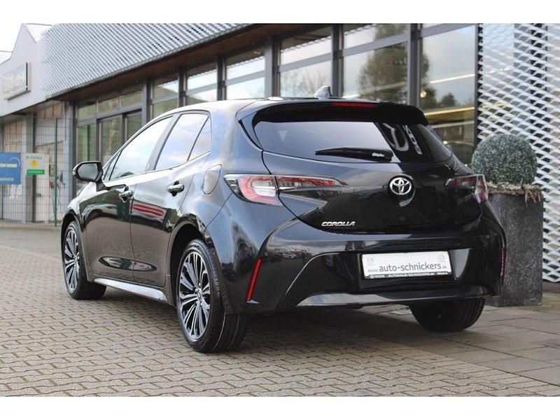 Gebraucht Toyota Corolla Hybrid Team 122 PS (89 kW) 2023 Schwarz Limousine