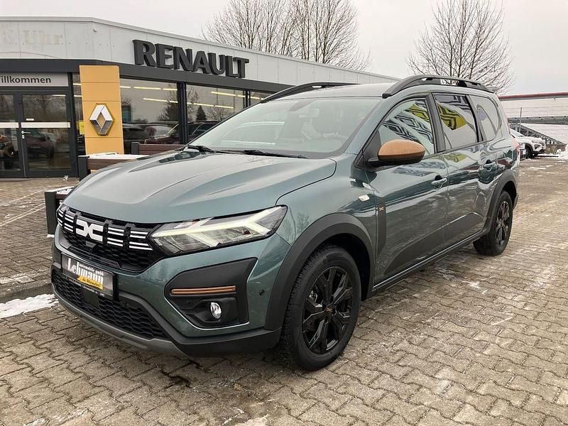 Grün Gebraucht 2023 Dacia Jogger Extreme Van / Kleinbus | 18.950 € (Fairer Preis) - Bild 1/4