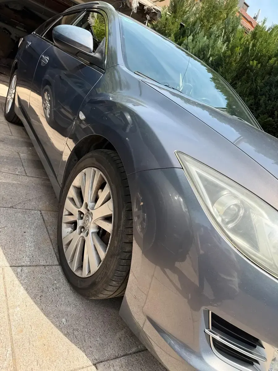 Używany Mazda 6 140 KM (102 kW) 2010 Srebrny Kombi