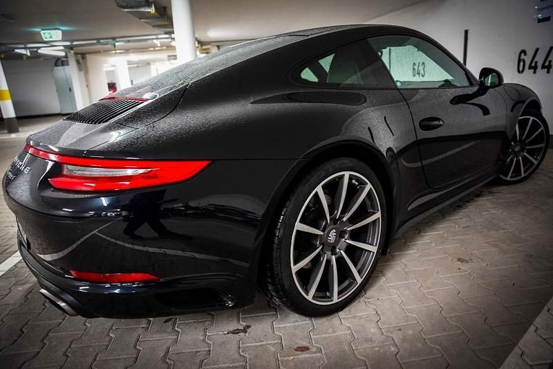 Schwarz Gebraucht 2016 Porsche 911 Carrera 4 Coupé | 87.911 € (Superpreis) - Bild 1/4