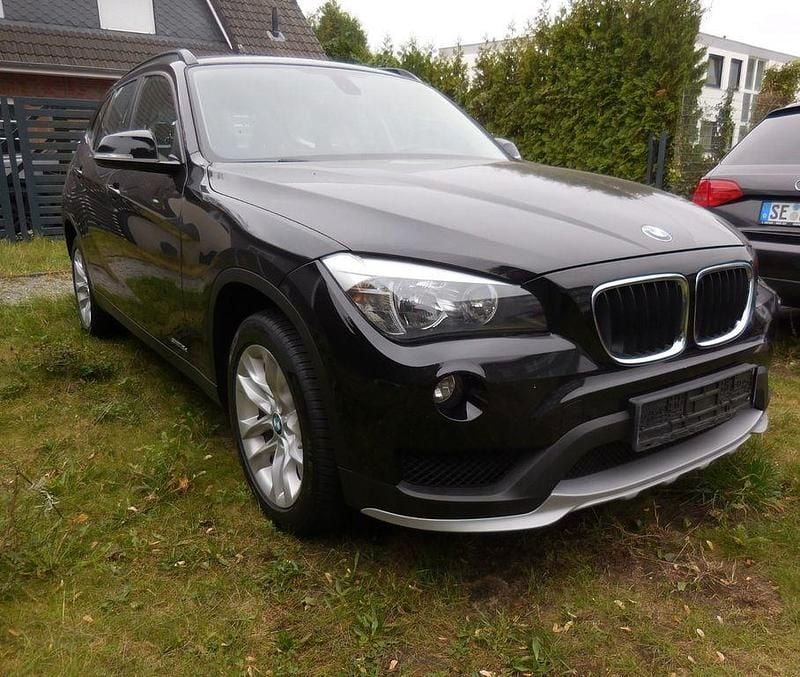 Schwarz Gebraucht 2015 BMW X1 Advantage SUV | 8.490 € (Guter Preis) - Bild 1/4