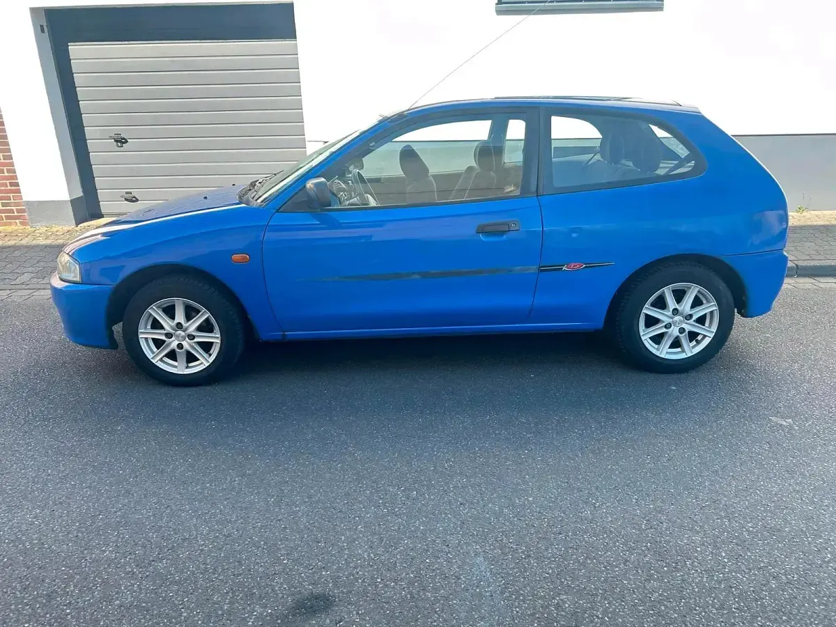 Gebraucht Mitsubishi Colt 75 PS (55 kW) 1999 Blau Kleinwagen