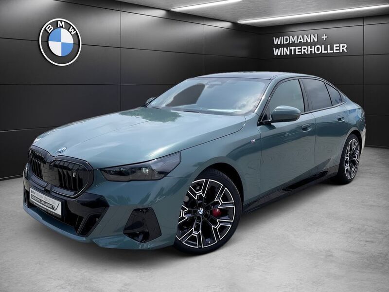 Grün Gebraucht 2024 BMW i5 Comfort Edition Limousine | 58.480 € - Bild 1/4