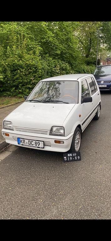 Gebraucht Daihatsu Cuore 41 PS (30 kW) 1989 Weiß Kleinwagen