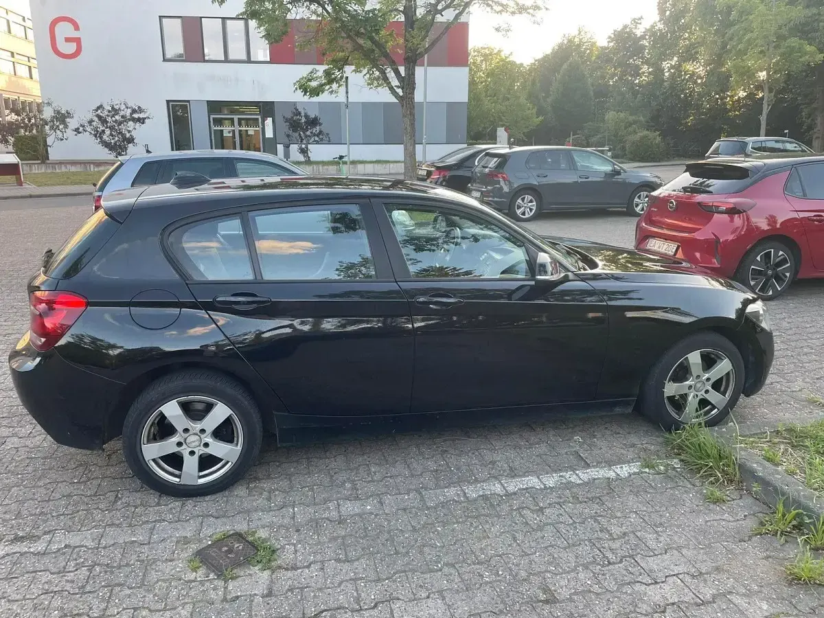Gebraucht BMW 114 102 PS (75 kW) 2012 Schwarz Kleinwagen