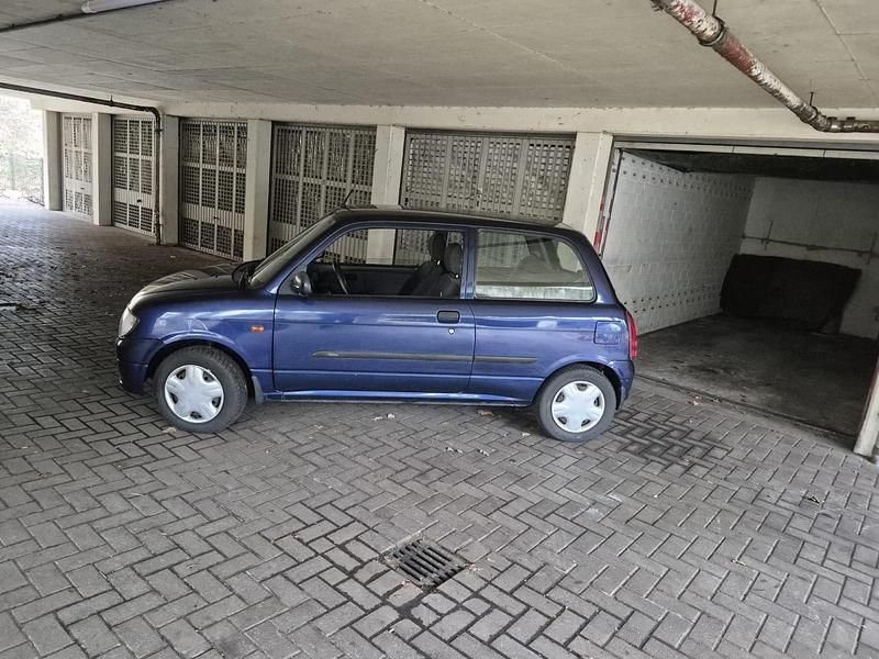 Gebraucht Daihatsu Cuore 56 PS (41 kW) 2001 Blau Kleinwagen