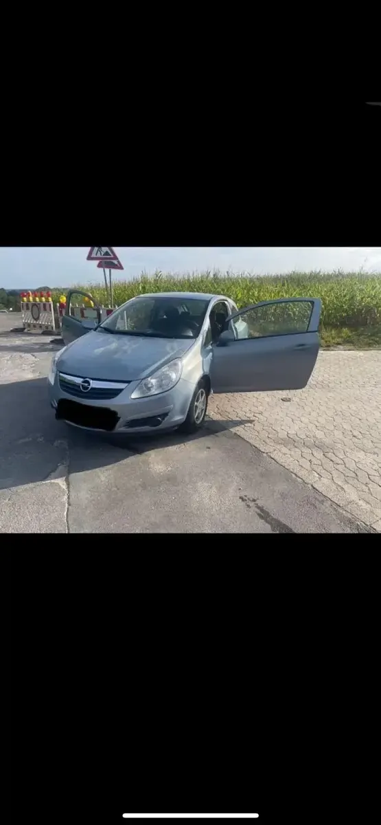 Second-hand Opel Corsa 59 CP (43 kW) 2009 Albastru Hatchback