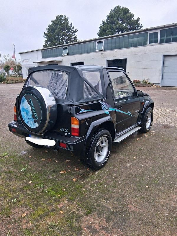 Gebraucht Suzuki Vitara 86 PS (63 kW) 1994 Schwarz Cabrio