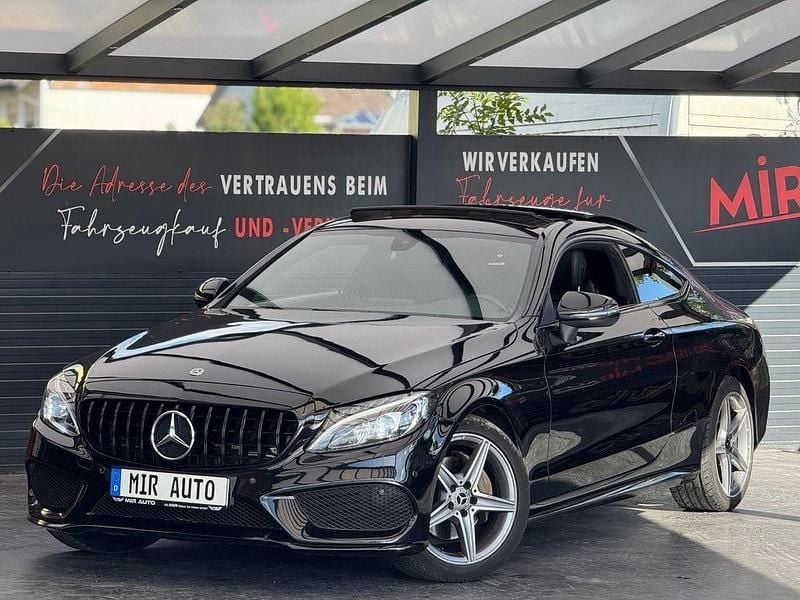 Schwarz Gebraucht 2018 Mercedes C180 AMG line Coupé | 23.900 € (Teuer) - Bild 1/4