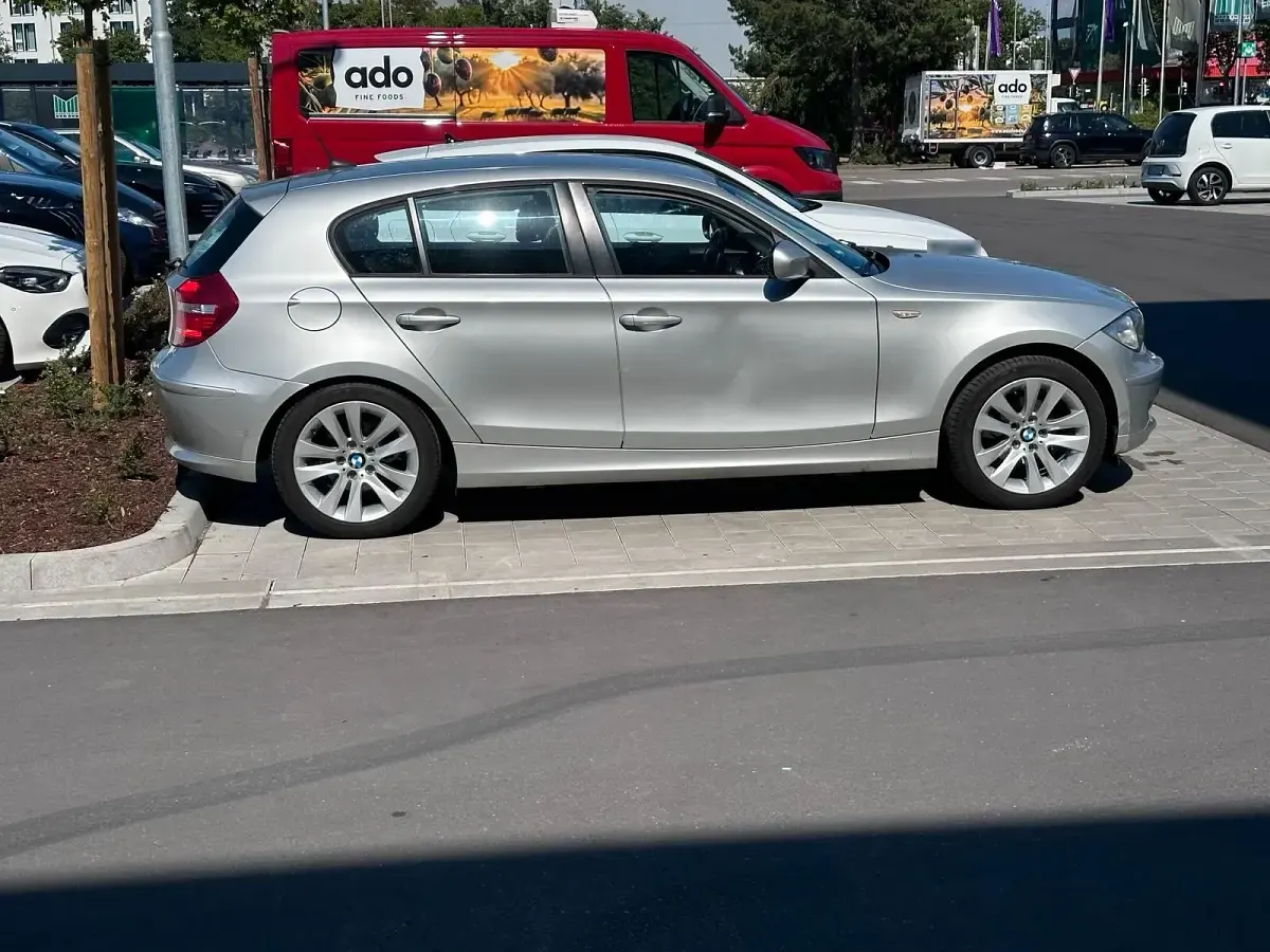 Gebraucht BMW 116 122 PS (89 kW) 2010 Grau Kleinwagen