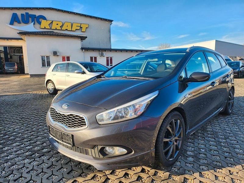 Grau Gebraucht 2013 Kia Ceed Sportswagon Kombi | 6.450 € (Fairer Preis) - Bild 1/4
