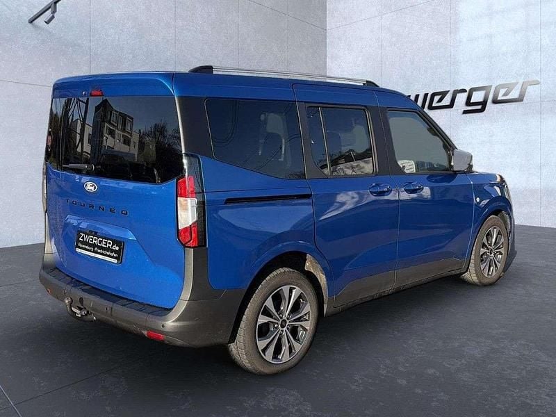 Gebraucht Ford Tourneo Titanium 125 PS (91 kW) 2024 Dessert island blue Kombi
