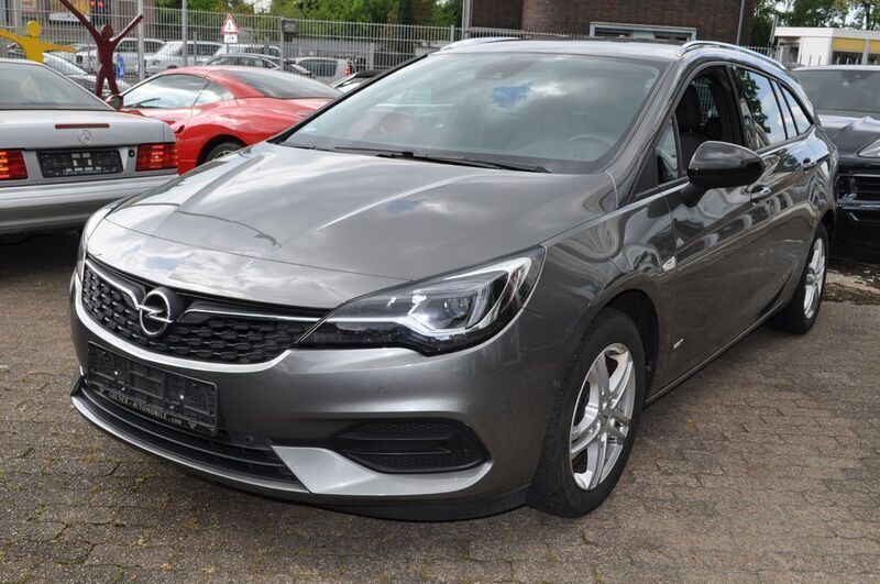 Grau Gebraucht 2021 Opel Astra Design Edition Kombi | 14.950 € (Fairer Preis) - Bild 1/4
