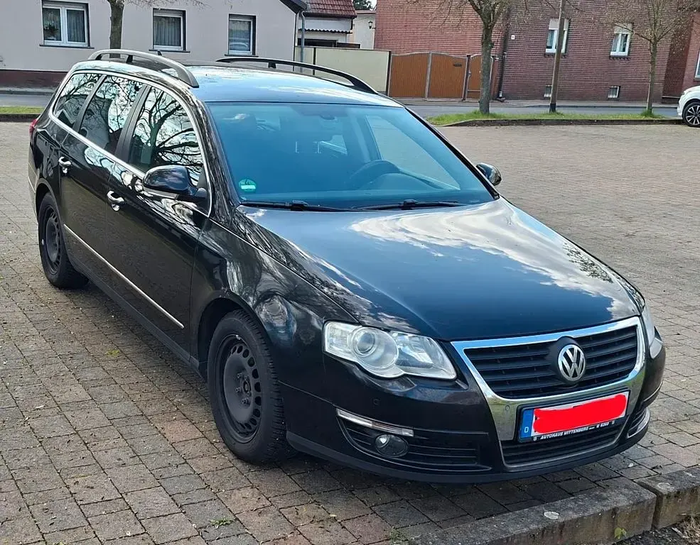 Second-hand VW Passat Sportline 160 CP (117 kW) 2009 Negru Break