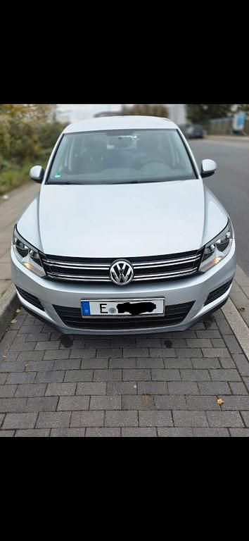 Grau Gebraucht 2014 VW Tiguan Exclusive SUV | 10.990 € (Fairer Preis) - Bild 1/4