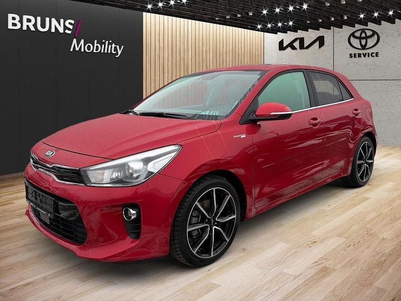 Gebraucht Kia Rio Platinum Edition 120 PS (88 kW) 2020 (beg) signalrot met. Limousine