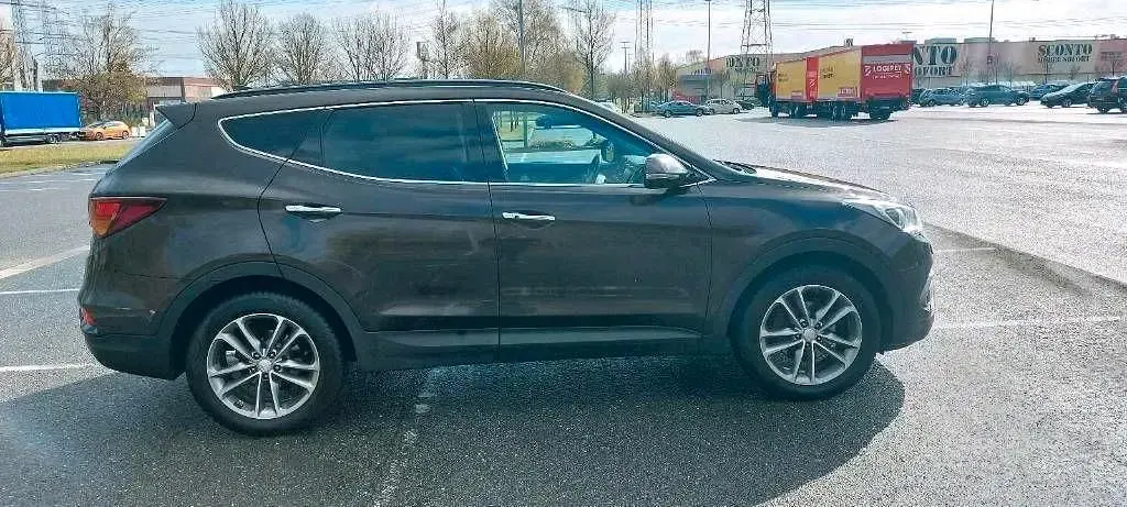 Gebraucht Hyundai Santa Fe Premium 200 PS (147 kW) 2016 Braun SUV