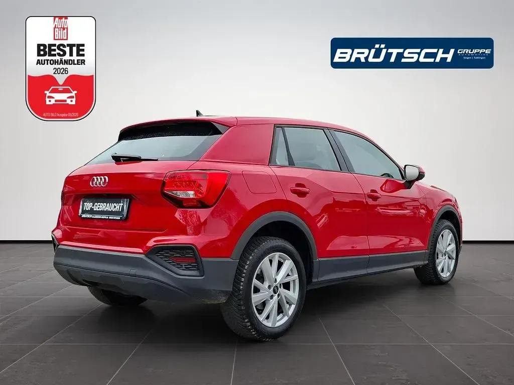 Gebraucht Audi Q2 Basis 150 PS (110 kW) 2022 Tangorot metallic SUV
