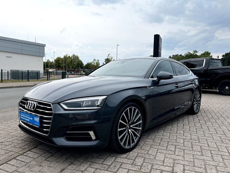 Grau Gebraucht 2019 Audi A5 Sportback Sport Limousine | 33.200 € (Fairer Preis) - Bild 1/4