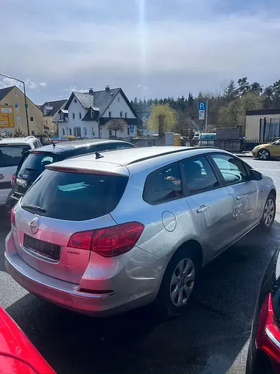 Używany Opel Astra Style 140 KM (102 kW) 2015 Srebrny Kombi