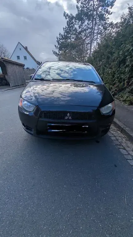 Gebraucht Mitsubishi Colt Edition 95 PS (69 kW) 2010 Schwarz Kleinwagen