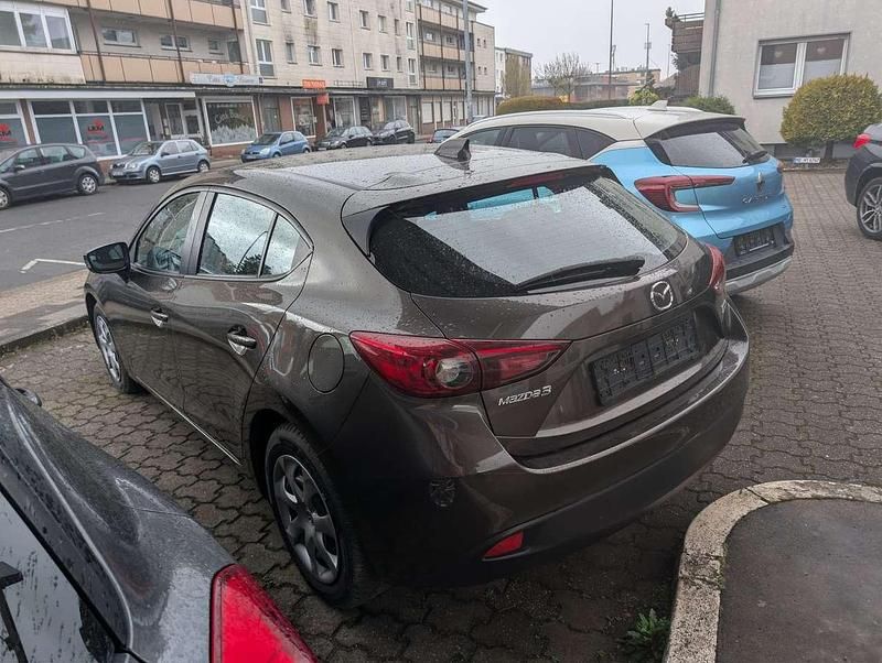 Gebraucht Mazda 3 Prime-Line 101 PS (74 kW) 2014 Obsidiangrau metallic Kleinwagen