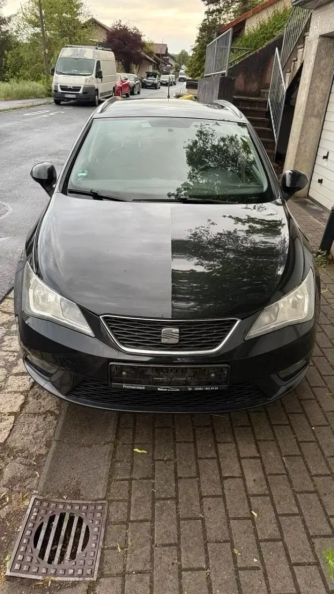 Używany Seat Ibiza ST 105 KM (77 kW) 2013 Czarny Kombi